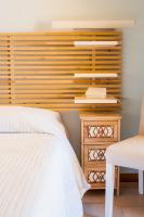 A bed or beds in a room at La Casa Sul Porto - Italian Homing