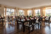 Un restaurante u otro lugar para comer en Gutshof Havelland