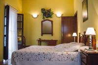 A bed or beds in a room at Posada Marina