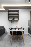 Posedenie v ubytovaní Adelle Apartments, The Luxury Suites