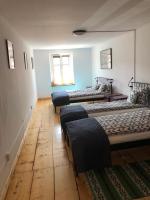 Posteľ alebo postele v izbe v ubytovaní Apartament w Rynku