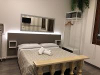 Posteľ alebo postele v izbe v ubytovaní Rooms Giulietta e Romeo