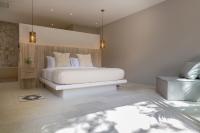 Ein Bett oder Betten in einem Zimmer der Unterkunft Cielo Boutique Hotel & Spa Samui