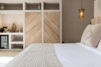 Ein Bett oder Betten in einem Zimmer der Unterkunft Cielo Boutique Hotel & Spa Samui