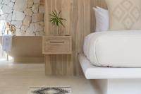 Ein Bett oder Betten in einem Zimmer der Unterkunft Cielo Boutique Hotel & Spa Samui