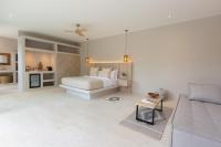 Ein Bett oder Betten in einem Zimmer der Unterkunft Cielo Boutique Hotel & Spa Samui