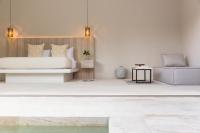 Ein Bett oder Betten in einem Zimmer der Unterkunft Cielo Boutique Hotel & Spa Samui