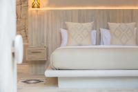 Ein Bett oder Betten in einem Zimmer der Unterkunft Cielo Boutique Hotel & Spa Samui