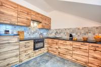 Kuchyňa alebo kuchynka v ubytovaní Apartamenty Maja i Zuzia
