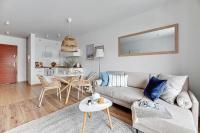 Ein Sitzbereich in der Unterkunft Waterlane Riverside - SPA, Pool, Gym &amp; Parking by Downtown Apartments