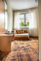 Łóżko lub łóżka w pokoju w obiekcie Hotel Zamek