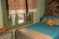 A bed or beds in a room at Dandy Villas Metsovo-Metska-Down Town-Up to 7