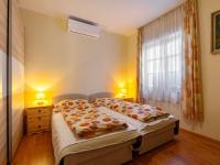 Posteľ alebo postele v izbe v ubytovaní Holiday Home Tamas - SZA180 by Interhome