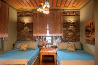 A bed or beds in a room at Dandy Villas Metsovo-Metska-Down Town-Up to 7