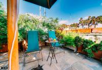 Vonkajšia záhrada v ubytovaní Luxury art apartment in Trastevere with terrace