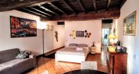 A bed or beds in a room at Sweet Home Panisperna