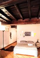 A bed or beds in a room at Sweet Home Panisperna