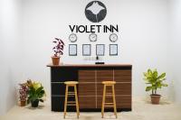 Certifikát, hodnocení, plakát nebo jiný dokument vystavený v ubytování Violet Inn Hotel