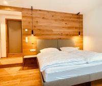 Posteľ alebo postele v izbe v ubytovaní AUSZEIT Appartement