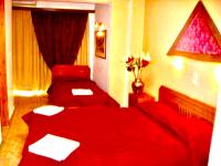 Posteľ alebo postele v izbe v ubytovaní delphi aiolos center hotel panoramic view&yoga harmony hotel&rooms