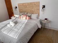A bed or beds in a room at Vilamarlux VI