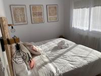 A bed or beds in a room at Vilamarlux VI