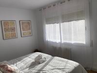 A bed or beds in a room at Vilamarlux VI