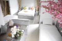 Ein Bett oder Betten in einem Zimmer der Unterkunft Samui Beach Residence Hotel