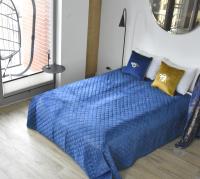 Posteľ alebo postele v izbe v ubytovaní LOFT 1&2 - Grano Residence