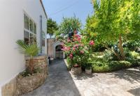 Vonkajšia záhrada v ubytovaní Apartments Mirjana Blue Beach