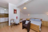 Posteľ alebo postele v izbe v ubytovaní Apartments Mirjana Blue Beach