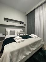 Posteľ alebo postele v izbe v ubytovaní Calma Suite (Cielo suites)