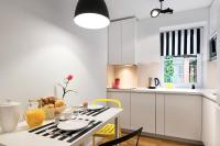 Kuchyň nebo kuchyňský kout v ubytování Costa Apartments