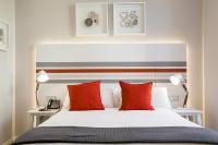 Posteľ alebo postele v izbe v ubytovaní Legazpi Doce Rooms & Suites
