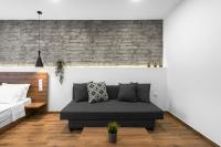 Posteľ alebo postele v izbe v ubytovaní Adelle Apartments, The Luxury Suites