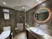 a bathroom with a sink and a mirror at HINOEN Hotel in Taipei