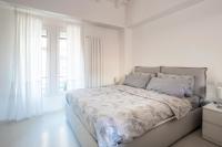 A bed or beds in a room at [DESIGN LOFT] Walking distance Brera-Duomo with Wifi+Netflix