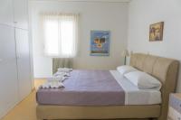 Posteľ alebo postele v izbe v ubytovaní Sunny Apartment