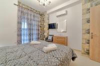Posteľ alebo postele v izbe v ubytovaní Faraggi Villas