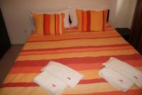 Postel nebo postele na pokoji v ubytování Borovets Gardens Apartments