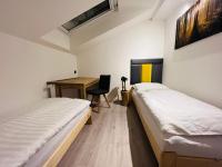 Postel nebo postele na pokoji v ubytování Apartmány Panorama Harrachov