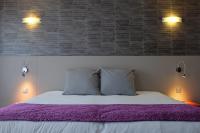 Cama o camas de una habitaci&oacute;n en Hotel &amp; Spa Marina d&#39;Adelphia