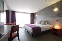 Cama o camas de una habitaci&oacute;n en Hotel &amp; Spa Marina d&#39;Adelphia