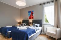 Postel nebo postele na pokoji v ubytování Costa Apartments