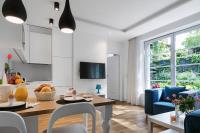 TV a/nebo společenská místnost v ubytování Costa Apartments
