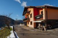 a building on the side of a street at Apartment Jorsi with Mountain View in Zreče