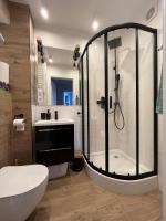 Kúpeľňa v ubytovaní Apartament Wspomnienie