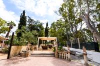 A garden outside Giardini Sausari Residence