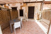 A patio or other outdoor area at Giardini Sausari Residence