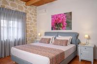 Postel nebo postele na pokoji v ubytování Kontis Village